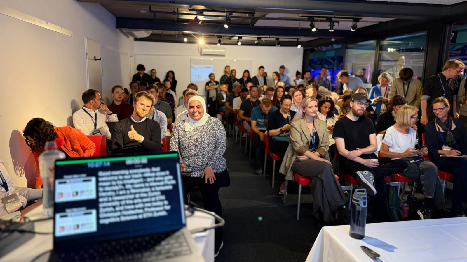 The packed session room, with Melika Payvand, Jonnie Penn and Menna El-Assady in the front row